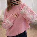 Pull rose manches bouffantes